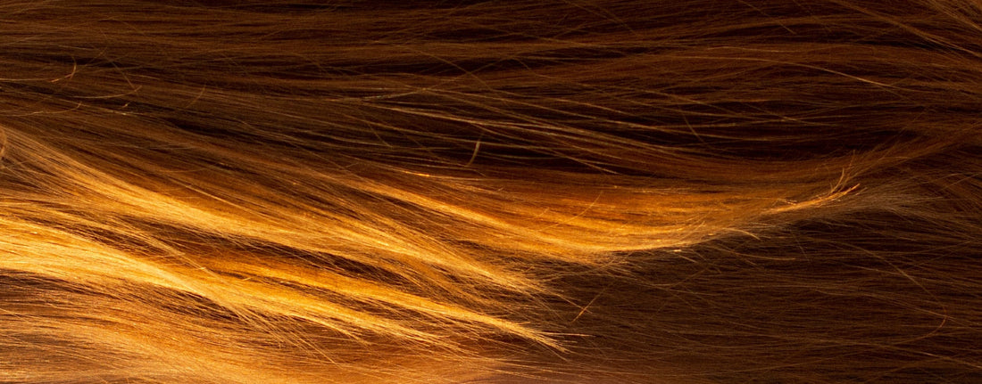 Woman holding product for colored hair