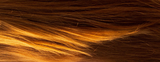 Woman holding product for colored hair